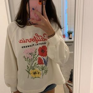 Cream colored sweater with coastal flowers from Old Navy size medium